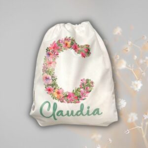Mochila personalizada con inicial de flores